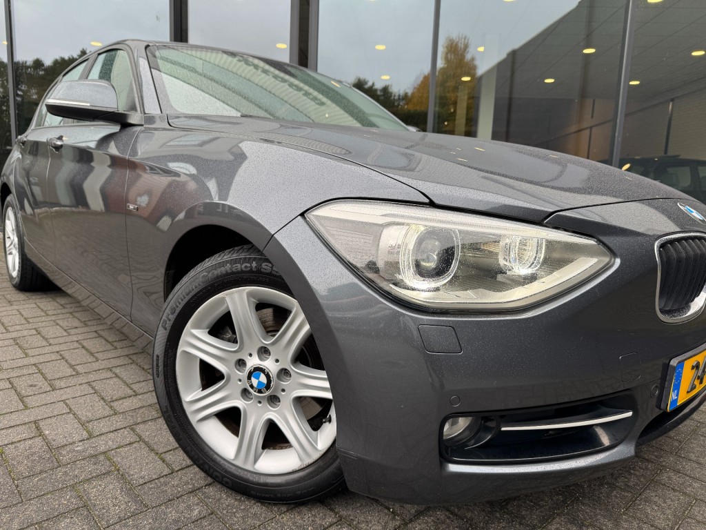 BMW-1-SERIE-118i 170pk Sportline,Leer,Xenon,Navi,Clima,Cruise,Dealer OH