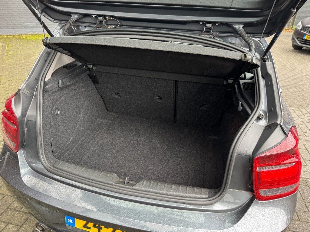 BMW-1-SERIE-118i 170pk Sportline,Leer,Xenon,Navi,Clima,Cruise,Dealer OH