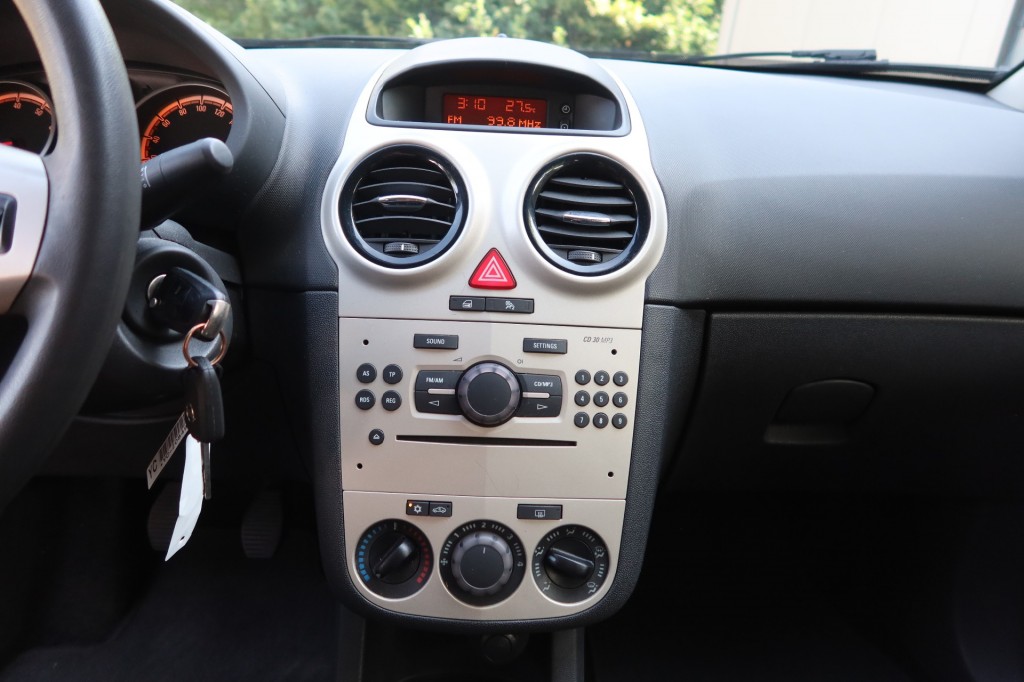 OPEL-CORSA-1.2-16V ENJOY airco 3 drs. Extreem lage KM tand !